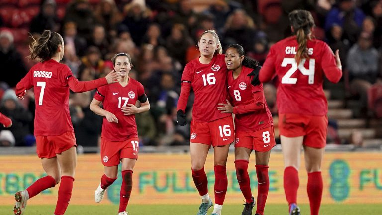 Canada's Janine Beckie, third from right, celebrates with teammates after scoring her side's first goal during the Arnold Clark Cup women's soccer match between England and Canada. (Zac Goodwin/PA via AP)