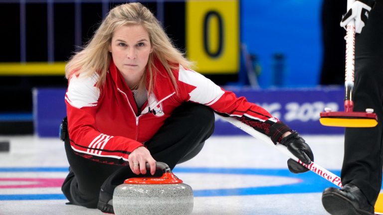 Canadian skip Jennifer Jones delivers a shot as they face the team from the Russian Olympic Committee at the 2022 Winter Olympics in Beijing on Monday, February 14, 2022. (Paul Chiasson/CP)