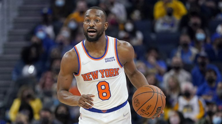 New York Knicks guard Kemba Walker dribbles the ball up the court against the Golden State Warriors during the first half of an NBA basketball game in San Francisco. (Jeff Chiu/AP)