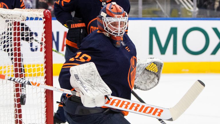 Edmonton Oilers' goalie Mikko Koskinen (19) makes the save against the Nashville Predators during first period NHL action in Edmonton on Thursday, January 27, 2022. (Jason Franson/CP)