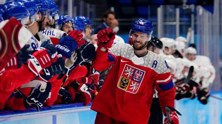 Czech Republic's David Krejci (46) is congratulated after scoring the winning shoot-out goal against Switzerland during a preliminary round men's hockey game at the 2022 Winter Olympics, Friday, Feb. 11, 2022, in Beijing. (Matt Slocum/AP Photo)