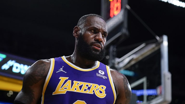 Los Angeles Lakers' LeBron James walks away from the basket during the first half of the team's NBA basketball game against the Cleveland Cavaliers. (Jae C. Hong/AP)