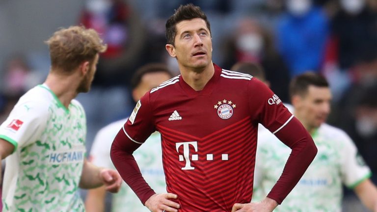 Bayern's Robert Lewandowski reacts after Fuerth's Branimir Hrgota scored his side's opening goal during the German Bundesliga soccer match between Bayern Munich and SpVgg Greuther Fuerth at the Allianz Arena Stadium in Munich, Germany, Sunday, Feb. 20, 2022. (Alexandra Beier/AP)