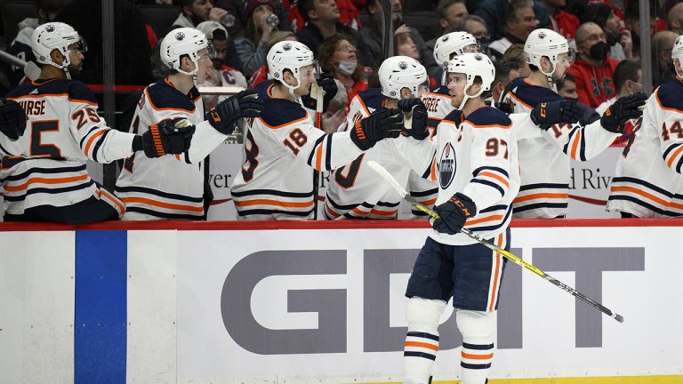 Edmonton Oilers center Connor McDavid (97) is congratulated for his goal during the first period of the team's NHL hockey game. (Nick Wass/AP)