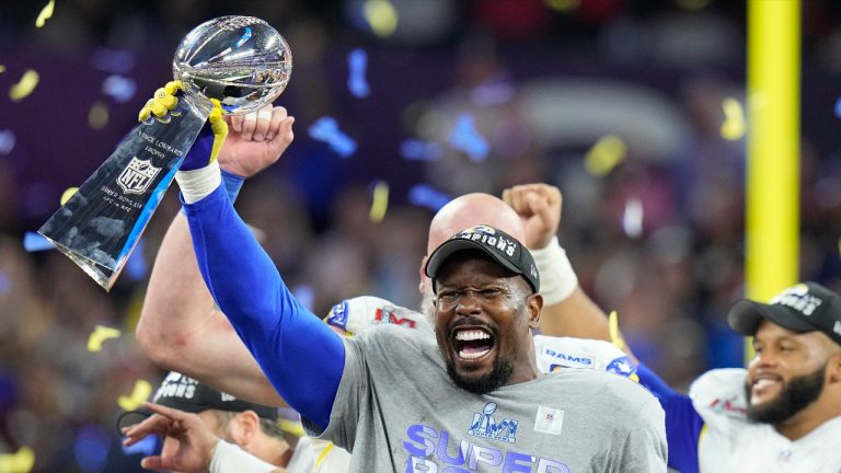 Los Angeles Rams outside linebacker Von Miller holds up the Lombardi Trophy after the Rams defeated the Cincinnati Bengals in the NFL Super Bowl 56 football game Sunday, Feb. 13, 2022, in Inglewood, Calif. (Chris O'Meara/AP Photo)