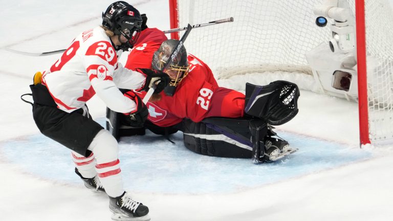 Canada forward Marie-Philip Poulin (29) scores on Switzerland goaltender Saskia Maurer during second period women's ice hockey semifinals action Monday, February 14, 2022 at the 2022 Winter Olympics in Beijing. (Ryan Remiorz/CP)