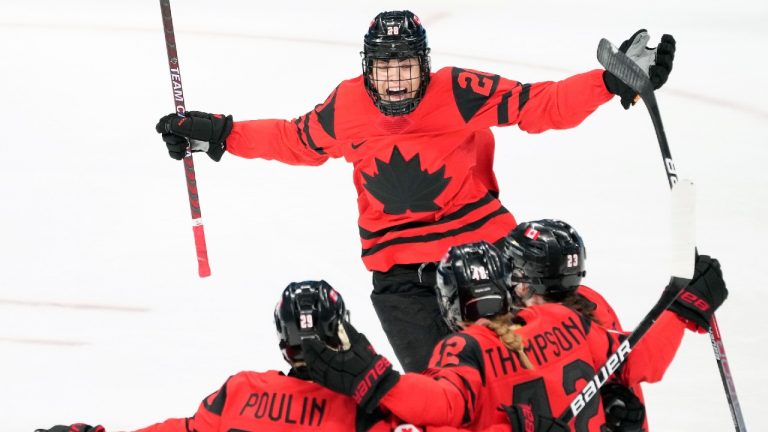 Team Canada forward Sarah Nurse (20) celebrates her goal against the United States with teammates Marie-Philip Poulin (29), Claire Thompson (42) and Erin Ambrose (23) during first period women's hockey gold medal game action at the 2022 Winter Olympics in Beijing on Thursday, Feb. 17, 2022. (Ryan Remiorz/CP)