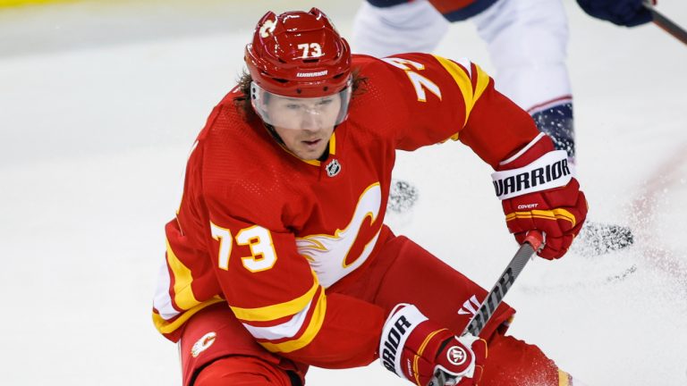 Calgary Flames' Tyler Toffoli chases the puck during third period NHL hockey action against the Columbus Blue Jackets in Calgary, Tuesday, Feb. 15, 2022. (Jeff McIntosh/CP)