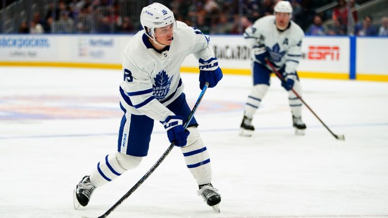 Toronto Maple Leafs' Mitchell Marner (16) shoots the puck during the third period of an NHL hockey game against the New York Islanders Sunday, Nov. 21, 2021, in Elmont, N.Y. (Frank Franklin II/AP)