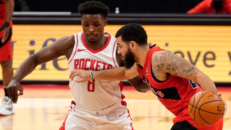 Toronto Raptors guard Fred VanVleet (23) drives around Houston Rockets forward Jae'Sean Tate (8) during the first half of an NBA basketball game Friday, Feb. 26, 2021, in Tampa, Fla. (Chris O'Meara/AP)