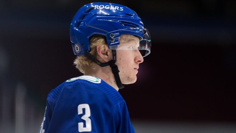 Vancouver Canucks' Jack Rathbone looks on during a stoppage in play during the first period of an NHL hockey game against the Calgary Flames in Vancouver, on Tuesday, May 18, 2021. (Darryl Dyck/CP)