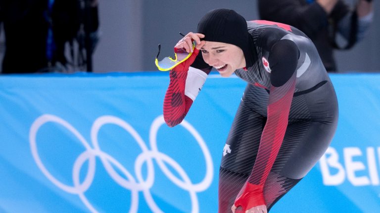 Isabelle Weidemann, of Canada, reacts at the end of her race to win the bronze medal in the women's 3,000 metre speedskating race at the 2022 Winter Olympics in Beijing on Saturday, February 5, 2022. (Paul Chiasson/THE CANADIAN PRESS)