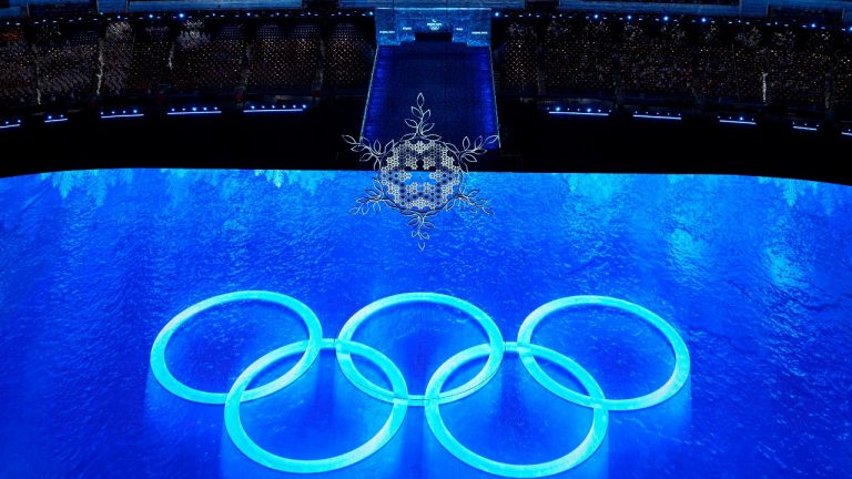 The Olympic rings are seen during the Closing Ceremony of the 2022 Winter Olympics, Sunday, Feb. 20, 2022, in Beijing. (Jeff Roberson/AP Photo)