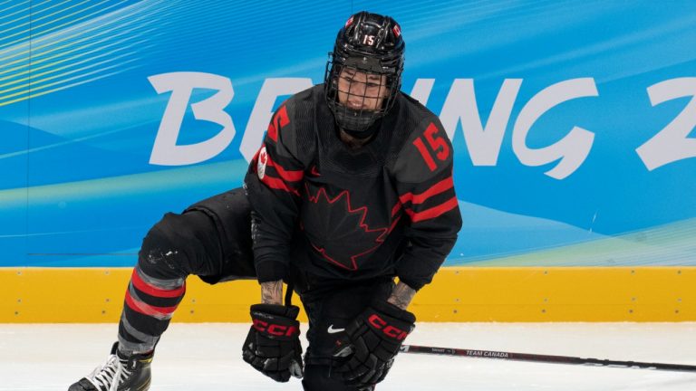 Team Canada forward Melodie Daoust (15) gets up after being injured during second period women’s ice hockey action against Switzerland Thursday, February 3, 2022 at the 2022 Winter Olympics in Beijing. (Ryan Remiorz/CP)