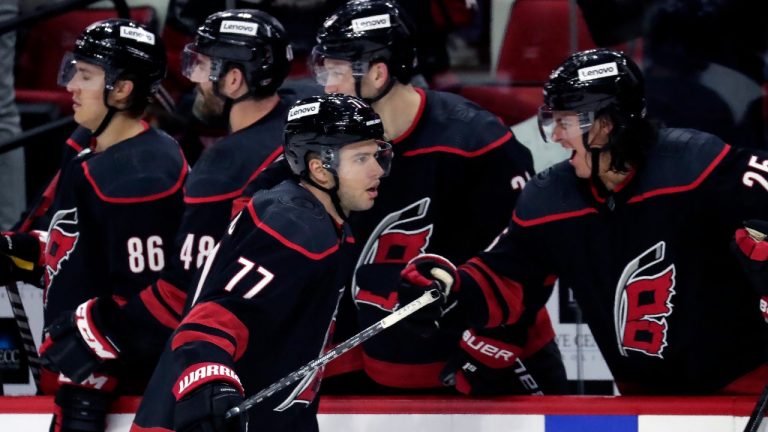 Carolina Hurricanes defenceman Tony DeAngelo (77) celebrates his goal after he scored against the Florida Panthers during the third period of an NHL hockey game Wednesday, Feb. 16, 2022, in Raleigh, N.C. (Chris Seward/AP)