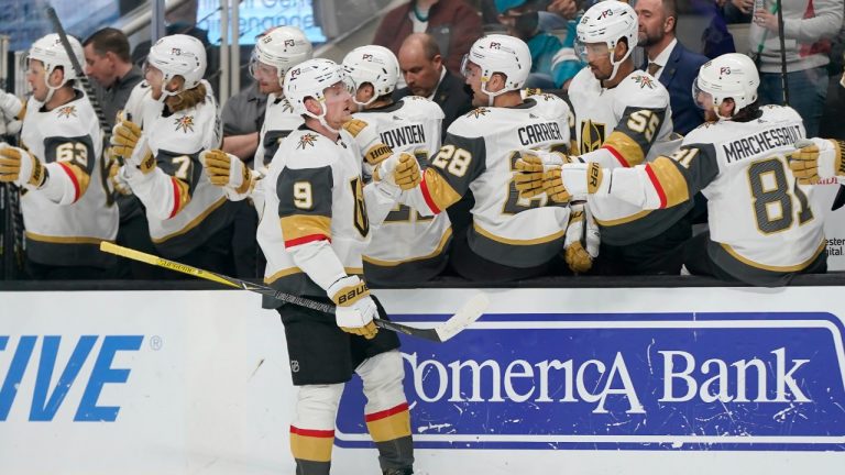 Vegas Golden Knights center Jack Eichel (9) is congratulated by teammates after scoring against the San Jose Sharks during the first period of an NHL hockey game in San Jose, Calif., Sunday, Feb. 20, 2022. (AP)