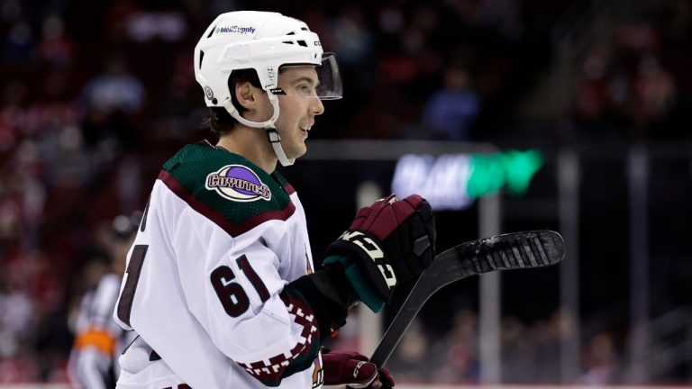 Arizona Coyotes defenseman Dysin Mayo reacts after scoring a goal against the New Jersey Devils during the second period of an NHL hockey game Wednesday, Jan. 19, 2022, in Newark, N.J. (Adam Hunger/AP)