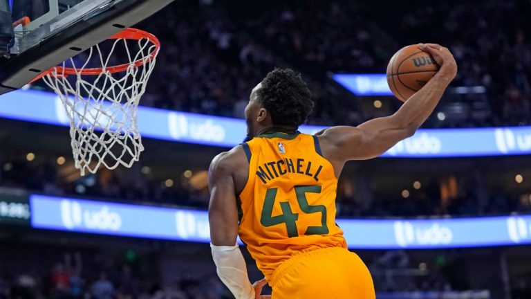 Utah Jazz guard Donovan Mitchell (45) dunks against the New York Knicks in the second half of an NBA basketball game, Monday, Feb. 7, 2022, in Salt Lake City. (Rick Bowmer/AP)