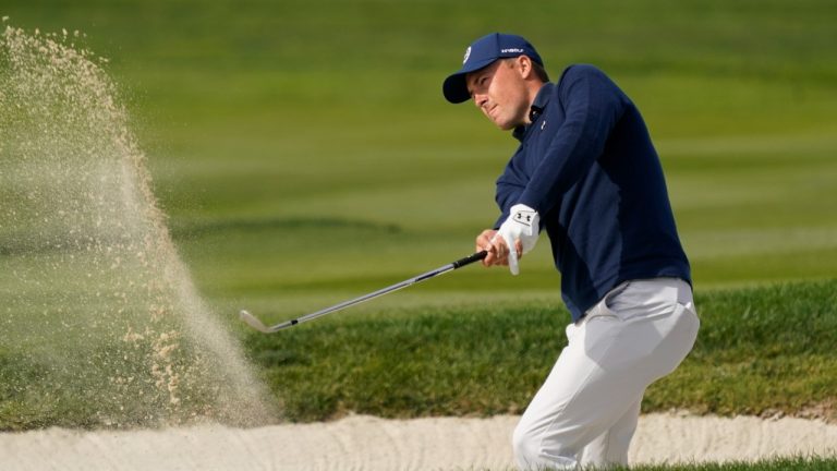 Jordan Spieth follows his shot out of a bunker up to the fourth green of the Pebble Beach Golf Links during the third round of the AT&T Pebble Beach Pro-Am golf tournament in Pebble Beach, Calif., Saturday, Feb. 5, 2022. (Eric Risberg/AP)