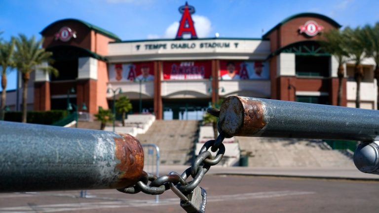 The main parking lot at the Los Angeles Angels Tempe Diablo Stadium remains closed as pitchers and catchers are not starting spring training workouts as scheduled as the Major League Baseball lockout enters its 77th day and will prevent pitchers and catchers from taking the field for the first time since October in Tempe, Ariz., Wednesday, Feb. 16, 2022. (Ross D. Franklin/AP)