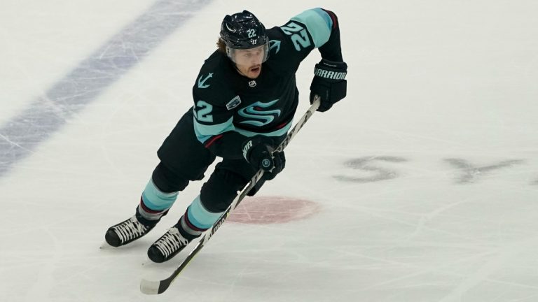 Seattle Kraken centre Mason Appleton (22) skates against the Arizona Coyotes during the first period of an NHL hockey game, Wednesday, Feb. 9, 2022, in Seattle. (Ted S. Warren/AP Photo)