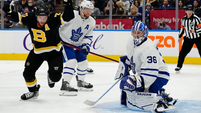 Boston Bruins' Taylor Hall (71) celebrates his goal on Toronto Maple Leafs goaltender Jack Campbell (36) as Maple Leafs' Morgan Rielly (44) looks on. (Frank Gunn/CP)