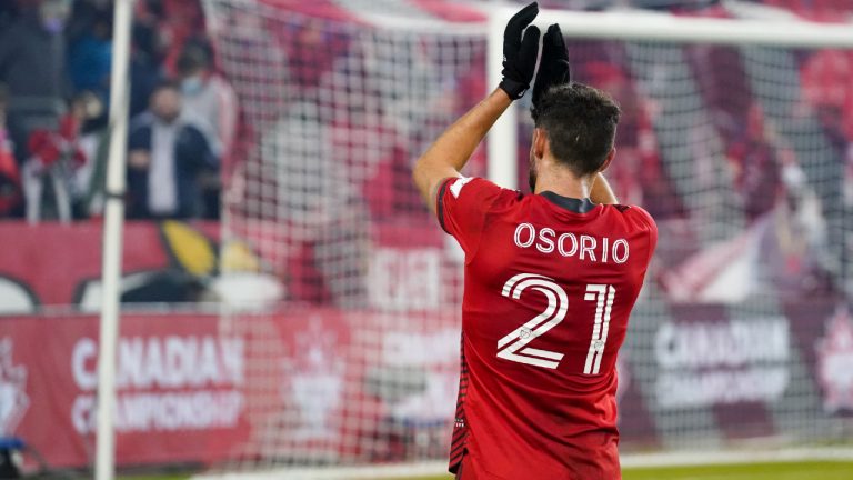 Toronto FC midfielder Jonathan Osorio salutes the fans after defeating Pacific FC in Canadian Championship semifinal. (Evan Buhler/CP)