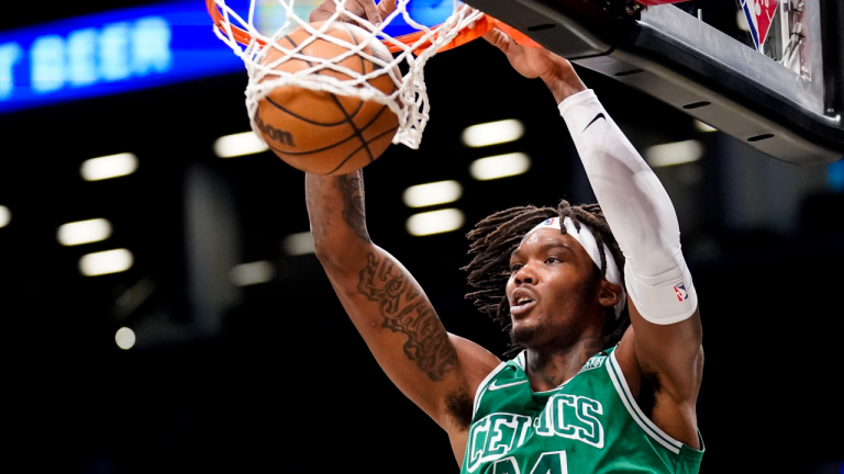 Boston Celtics center Robert Williams III dunks during the second half of an NBA basketball game against the Brooklyn Nets, Tuesday, Feb. 8, 2022, in New York. (AP/file)