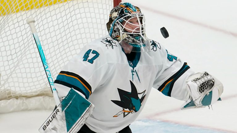 San Jose Sharks goaltender James Reimer (47) watches the puck on a shot attempt against the Edmonton Oilers during the third period of an NHL hockey game in San Jose, Calif., Monday, Feb. 14, 2022. (AP Photo/Jeff Chiu)