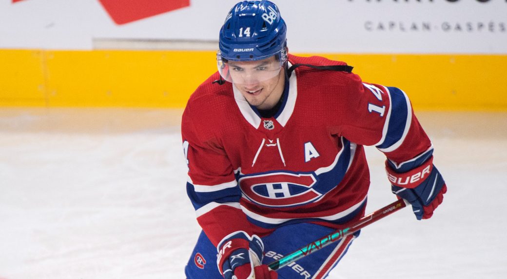 Nick Suzuki wearing the C in full hockey gear : r/Habs