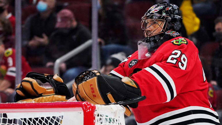 Chicago Blackhawks goaltender Marc-Andre Fleury looks at his teammates during the first period of an NHL hockey game against the Florida Panthers in Chicago, Sunday, Feb. 20, 2022. The Panthers won 5-2. (AP)