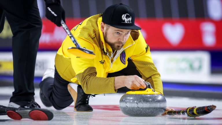 Team Manitoba skip Mike McEwen makes a shot against Team British Columbia at the Tim Hortons Brier in Lethbridge, Alta., Saturday, March 5, 2022. (CP)