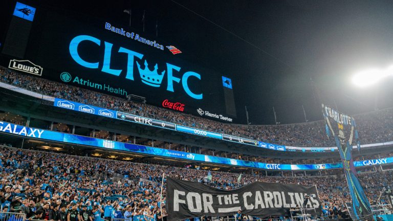 Fans cheer before an MLS soccer match between Charlotte FC and the LA Galaxy in Charlotte. (Jacob Kupferman/AP)