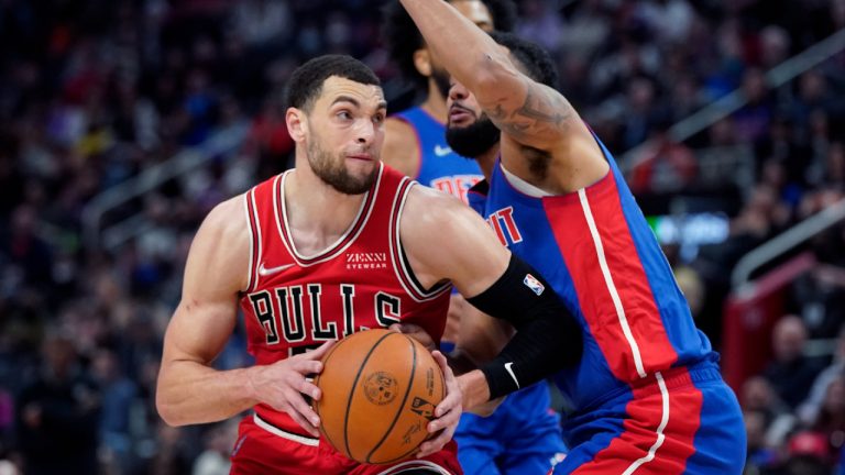 Chicago Bulls guard Zach LaVine (8) drives as Detroit Pistons guard Cory Joseph defends during the second half of an NBA basketball game, Wednesday, March 9, 2022, in Detroit. (Carlos Osorio/AP)