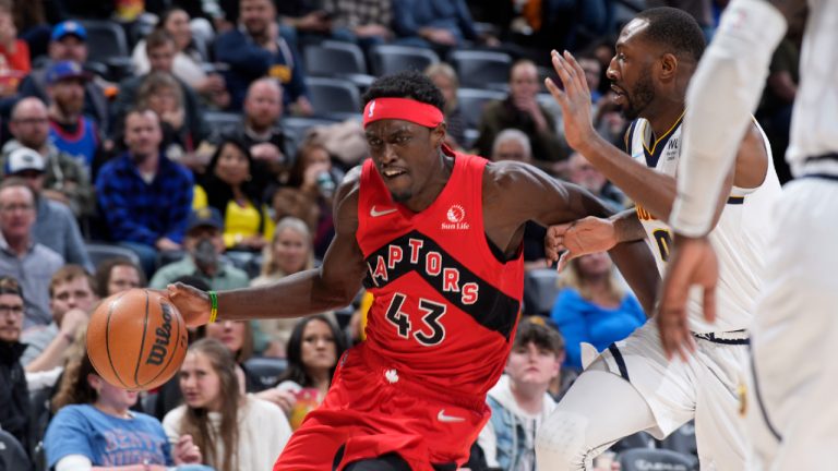 Toronto Raptors forward Pascal Siakam, drives to the basket past Denver Nuggets guard Davon Reed. (David Zalubowski/AP)