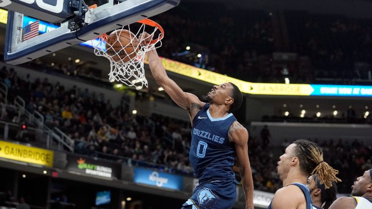 Memphis Grizzlies' De'Anthony Melton dunks during against the Indiana Pacers. (Darron Cummings/AP)