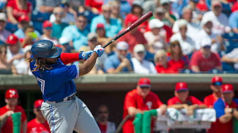 Toronto Blue Jays first baseman Vladimir Guerrero Jr. blasts a first inning home during a spring training game against the Philadelphia Phillies at BayCare Ballpark Saturday, March 19, 2022, in Clearwater, Fla. (CP)