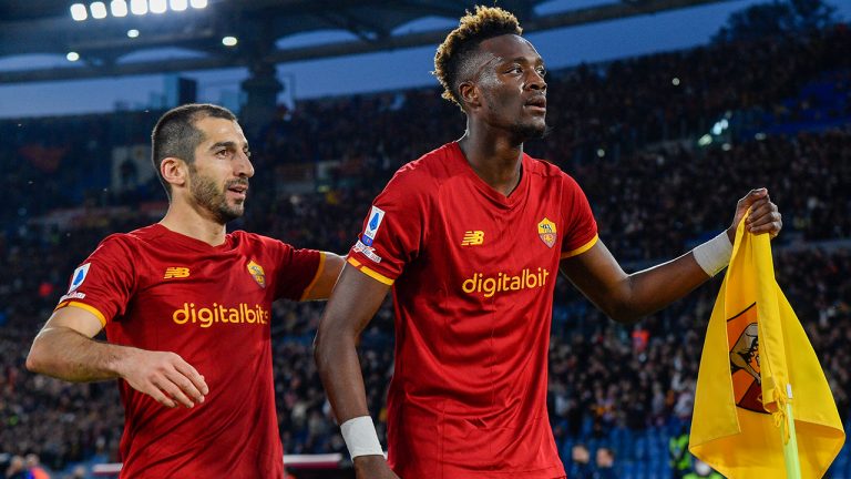 Roma's Tammy Abraham, right, celebrates after scoring his side's 2nd goal during a Serie A soccer match between Roma and Lazio at Rome's Olympic stadium, Sunday, March 20, 2022. (Fabrizio Corradetti/LaPresse via AP)