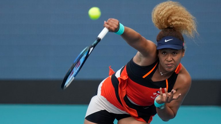 Naomi Osaka of Japan serves in her women's semifinal match against Belinda Bencic of Switzerland, at the Miami Open tennis tournament. (Rebecca Blackwell/AP)