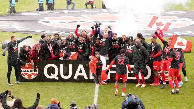 Canada players celebrate their win following second half CONCACAF World Cup soccer qualifying action against Jamaica, in Toronto on Sunday, March 27, 2022. (Nathan Denette/CP)