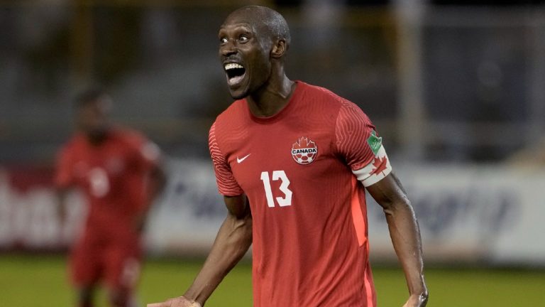 Canada's Atiba Hutchinson celebrates scoring his side's opening goal against El Salvador during a qualifying soccer match for the FIFA World Cup Qatar 2022 at Cuscatlan stadium in San Salvador, El Salvador, Wednesday, Feb. 2, 2022. (Moises Castillo/AP)