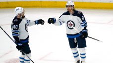 Connor notches four points as Jets hold on to beat Blackhawks