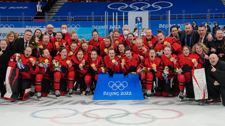 Team Canada celebrates with their gold medals after defeating the United States in women's hockey gold medal game action at the 2022 Winter Olympics in Beijing on Thursday, Feb. 17, 2022. (Ryan Remiorz/CP)