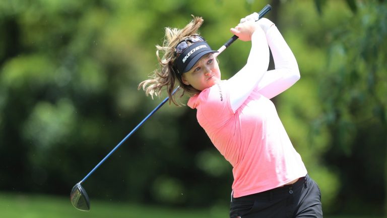 Brooke Henderson plays a shot from the 11th tee during her first round at the Women's World Championship of golf at Sentosa Golf Club in Singapore, Thursday, March 3, 2022. (Paul Miller/AP Photo)