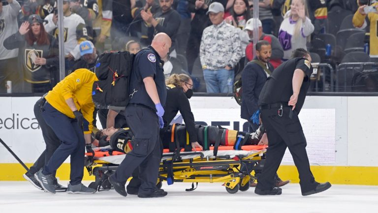 Vegas Golden Knights centre Brett Howden is carried off the ice after an injury during the first period of an NHL hockey game against the Nashville Predators, Thursday, March 24, 2022, in Las Vegas. (David Becker/AP Photo)