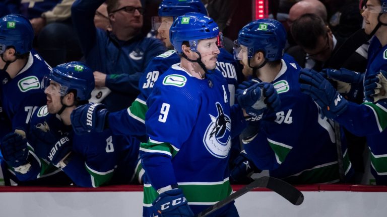 Vancouver Canucks' J.T. Miller celebrates his goal against the Toronto Maple Leafs during the first period of an NHL hockey game in Vancouver, on Saturday, February 12, 2022. (Darryl Dyck/CP)