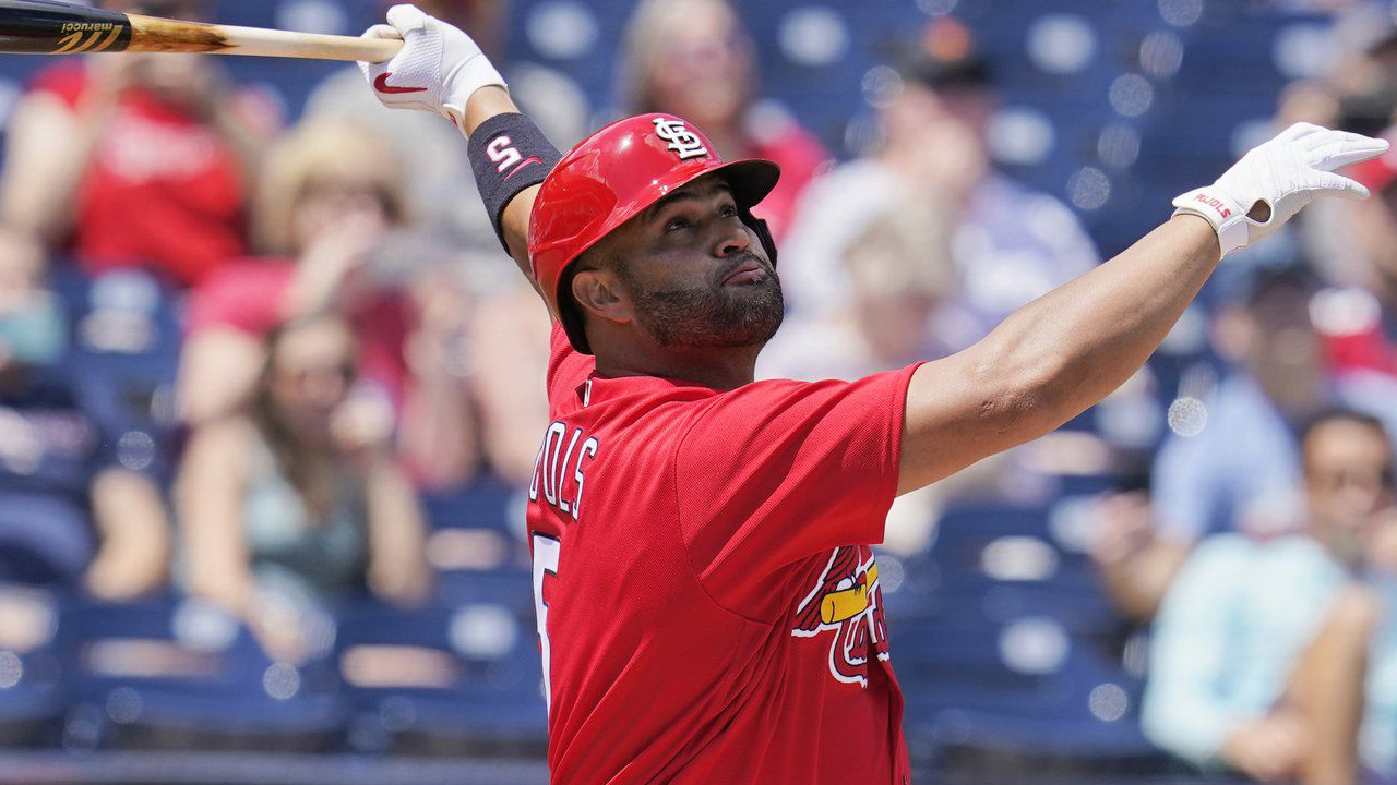 Pujols gets spring hit for Cards with wife in brain surgery