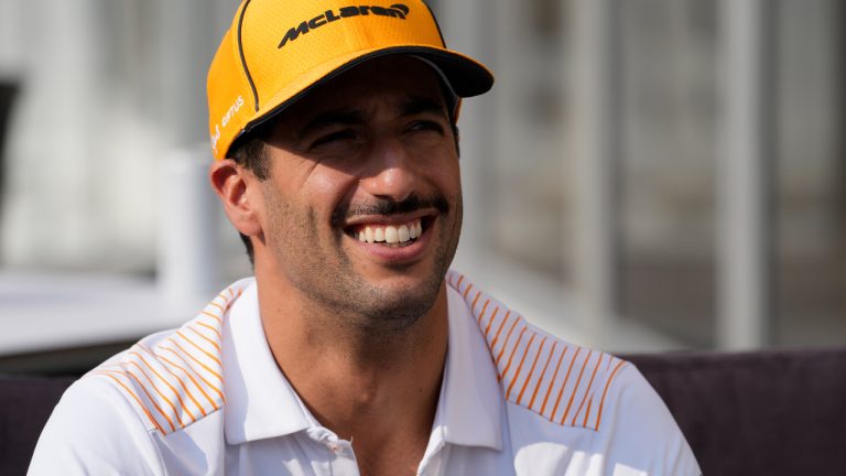 McLaren driver Daniel Ricciardo of Australia smiles at the Losail International Circuit in Losail, Qatar, Thursday, Nov. 18, 2021 ahead of the Qatar Formula One Grand Prix. (Darko Bandic/AP)