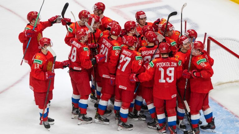 Russia players celebrates a win over Germany during the 2021 IIHF World Junior Hockey Championship. (Jason Franson/CP)