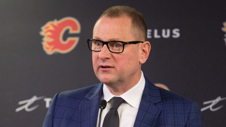 Calgary Flames General Manager Brad Treliving speaks at a press conference in Calgary (Larry MacDougal/CP)